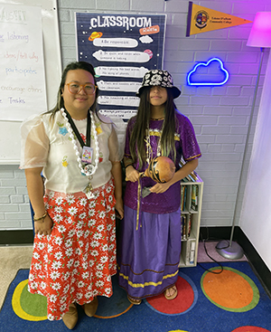 Two girls dressed for culture exchange event 